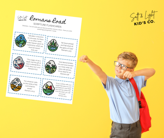 A boy points to the camera board with several pictures of mountains.