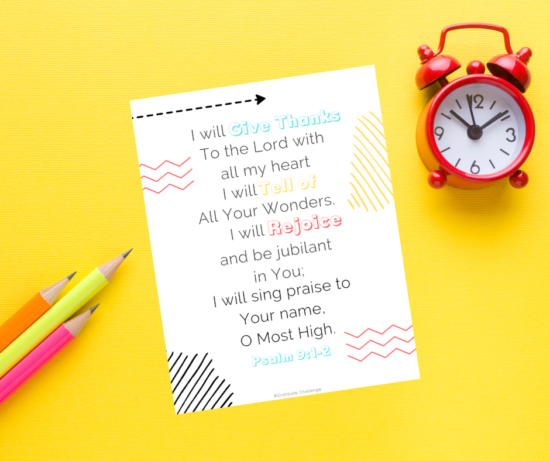 A colorful prayer card sitting on top of a table.